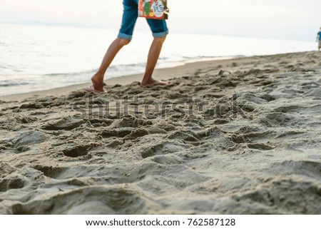 beach walk with sunset background,walk on sea beach on happy holiday