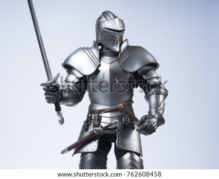 Knight in silver armour Royalty-Free Stock Photo #762608458