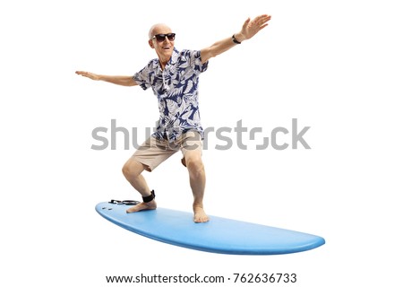 Joyful elderly man surfing isolated on white background