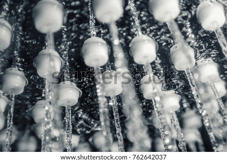 Shower head with running water closeup