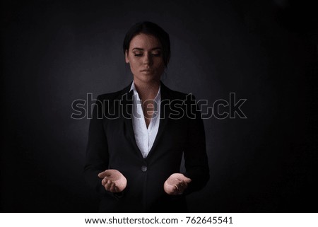 Innovation, future, futuristic object concept, business woman holding abstract glowing object, copy space for text design