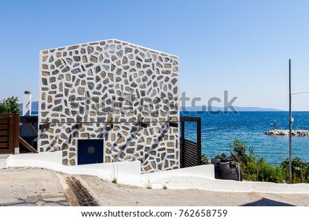 Decorated wall has seamless rocks, stone as a beautiful ancient style of house making and decorating.
