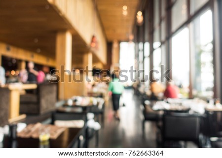 Abstract blur restaurant interior for background - vintage filter