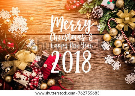 christman and newyear concept with arrange of decorating items on wooden top with free copy space for your creativity ideas text selective focused at wooden background
