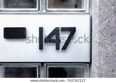 house number one hundred and forty seven (147)