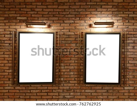 Duo blank frame on brick wall with lamp. Mockup poster blank marketing on the wall. Top view mockup poster on the wall.