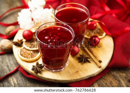 Hot winter drink with red berries