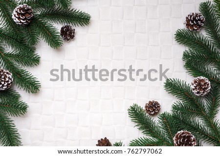 Christmas cozy background with spruce branches and branches