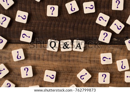 Questions and Answers Q&A concept. Q&A and question mark on alphabet tiles on wooden background Royalty-Free Stock Photo #762799873
