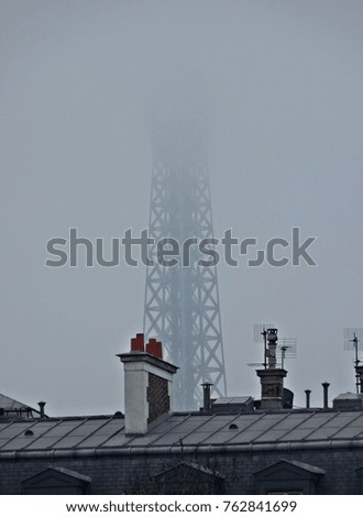 Paris Eiffel Tower in mist
