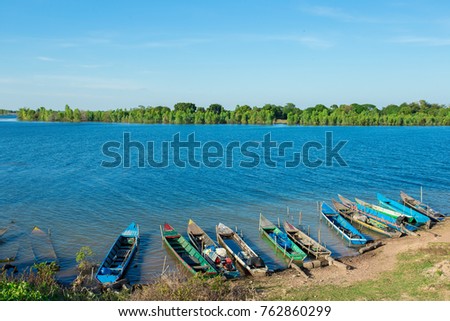 Fishing boats. Boat on a Lake Coast.