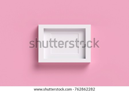 White picture frame on pink pastel background. sweet picture frame concept.