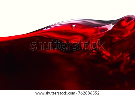 Red wine isolated on white background , abstract splashing , saved clipping path. Royalty-Free Stock Photo #762886552
