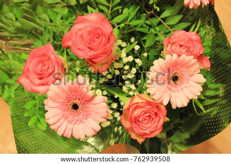 Bouquet of Flowers. Gerbera Daisy and Roses of White, Red and Pink Color Beautifully Arranged Assorted Top View Image of Bouquet. Present for Various Celebrations: Birthday, Wedding, Valentine's Day.
