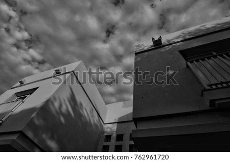 cloudy sky along with building.