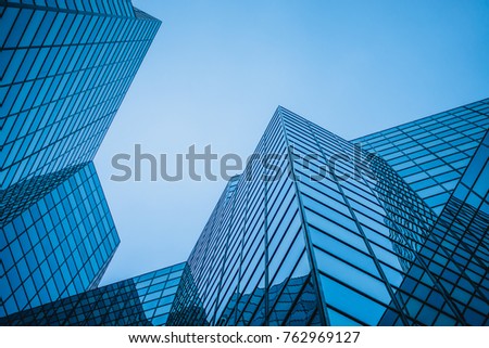 Abstract and Complex Blue Skyscraper Structure Downtown in Montreal with Sky in Background Royalty-Free Stock Photo #762969127