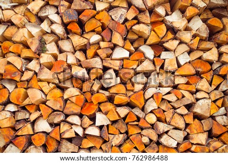 stacked firewood, background
