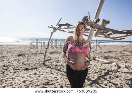 Pregnant blond woman in California 