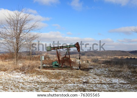 The old oil Field pump jack. USA, Ohio