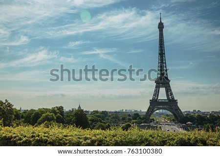 Seine River, Eiffel Tower and greenery under sunny blue sky, seen from the Trocadero in Paris. Known as one of the most impressive world’s cultural center. Northern France. Retouched photo.