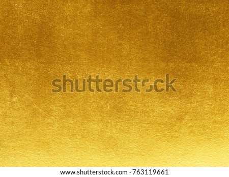 Shiny yellow leaf gold foil texture background Royalty-Free Stock Photo #763119661