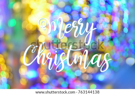 Merry Cristmas. Festive lights bokeh background.