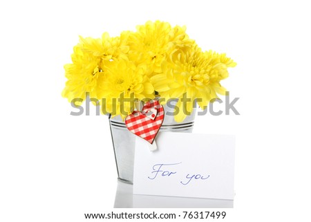 Yellow chrysanthemums in a bucket with chrysanthemums next card with the text "for you" and a pin with a red heart. Isolated