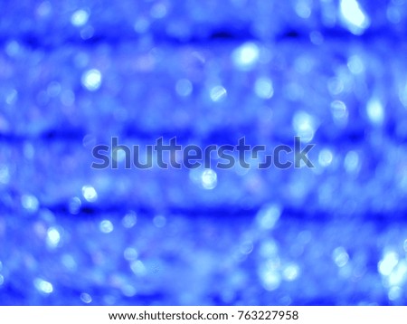 Decorative Abstract lights with abstract background of Blue. Good for Christmas and New Year celebrations. 