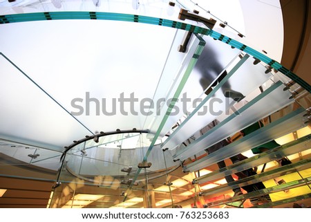 Modern Glass Staircase Silhouette of walking People in shanghai china.