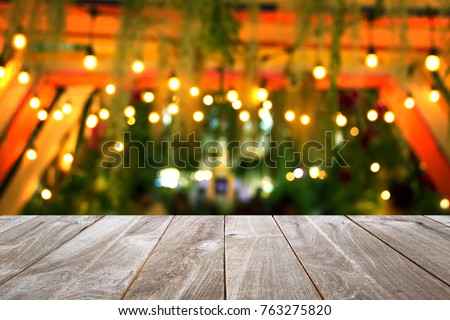 closeup top wood table with Blur Background, for your photo montage or product display, Space for placing items on the table.