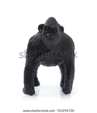 Plastic toy Baboon monkeys isolated on white background.