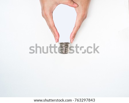creation thinking outside box.hand hold light bulb on white background isolated.
