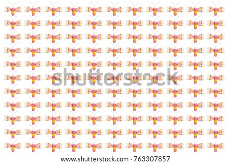 Dragonfly pattern background made from wood isolated on white background