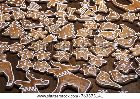 Closeup of gingerbread in shape of stars, snowflakes, birds, flowers, Christmas trees and elks for Christmas  celebration