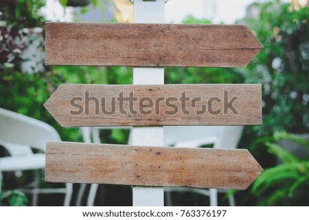 Empty wooden label on nature background