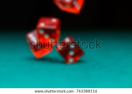 Defocused image of dice falling