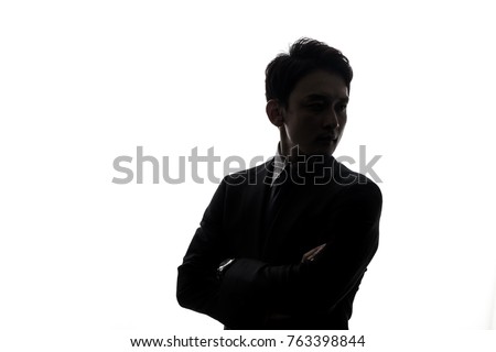Silhouette of businessperson.