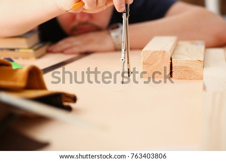 Arms of worker making structure plan on scaled paper closeup. Manual job DIY inspiration improvement job fix shop graphic joinery startup workplace idea designer career wooden bar ruler