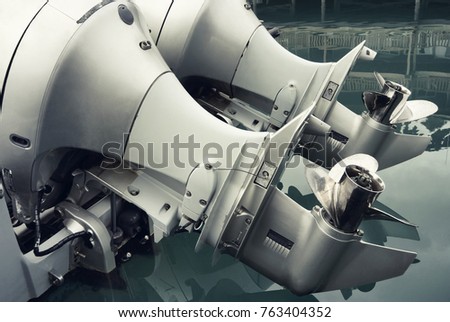 Close up of outboat engine propeller Royalty-Free Stock Photo #763404352