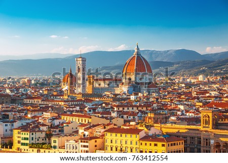 Beautiful view on hart of amazing Florence city and the Cathedral at sunrise, Florence, Italy Royalty-Free Stock Photo #763412554