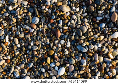 wet round pebbles background