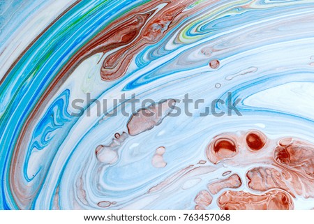 Abstract pattern, Traditional Ebru art. Painting on water, followed by paper prints. Color ink paint with waves. Marble background.