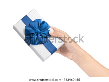 hand holding Gift  box with ribbon isolated on white background