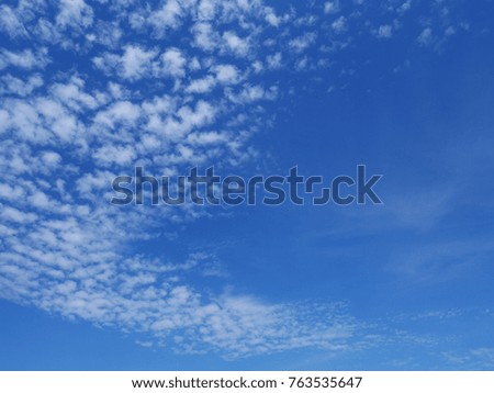 White clouds in the bright sky in beautiful nature.