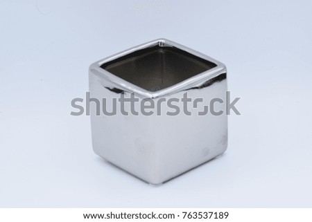 Silver and Gold Plant Potters on White Background