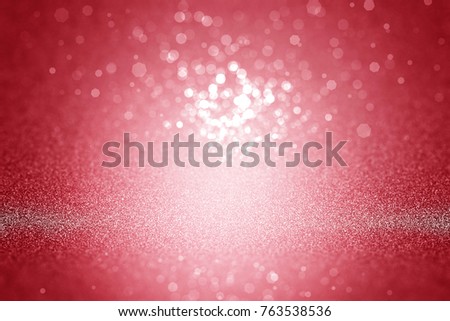 Red sparkle rays lights with bokeh elegant show on stage abstract background. Dust sparks background. 