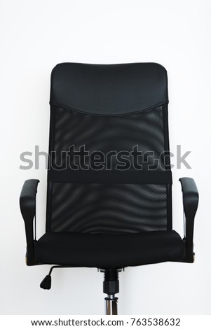 Empty black office chair with white background