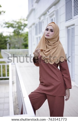 Beautiful young model in fashionable hijab style. 
