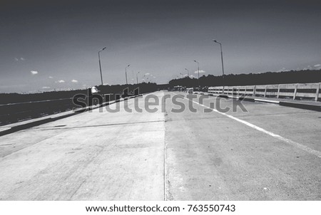 A road on the vintage bridge background wallpaper in monotone with free copy space.