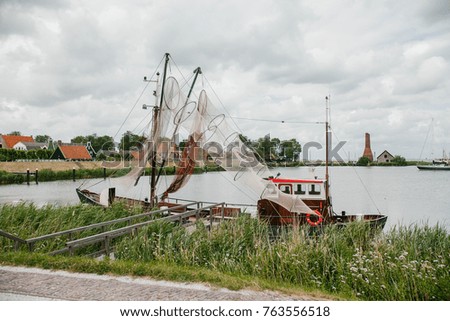 An old fishing boat on the water